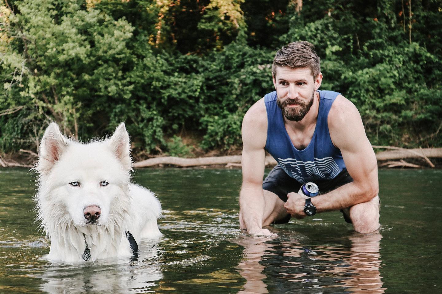 SJBauman with his dog in the river